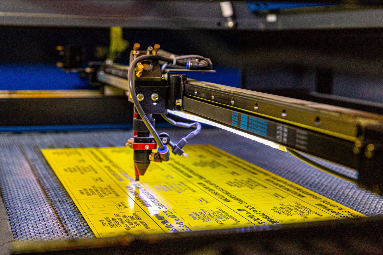 Laser Cutting Solar Electric Plates. Solar electric tags for sale. PV labels tags electrical.