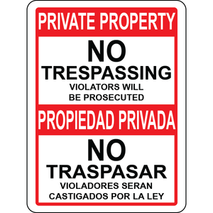 Bilingual no trespassing prosecuted warning sign