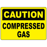 Caution compressed gas sign for identifying pressurized gas storage and hazardous work areas