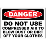 Danger sign warning not to use compressed air to blow dust off clothing in the workplace
