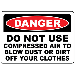 Danger sign warning not to use compressed air to blow dust off clothing in the workplace