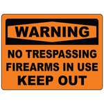 No trespassing firearms in use keep out warning sign