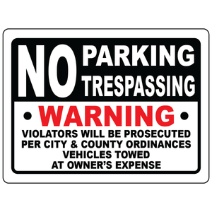 No parking trespass tow away prosecuted warning sign