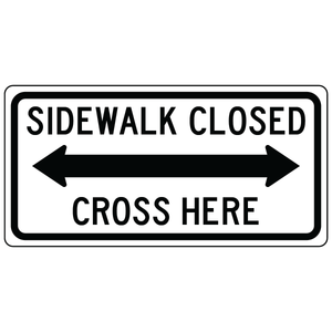 Sidewalk closed cross here double arrow sign guiding pedestrians to crossing area