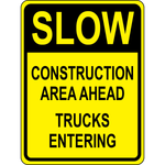 Slow construction trucks entering area warning sign