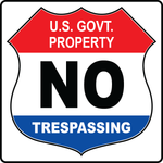 US government property no trespassing safety sign