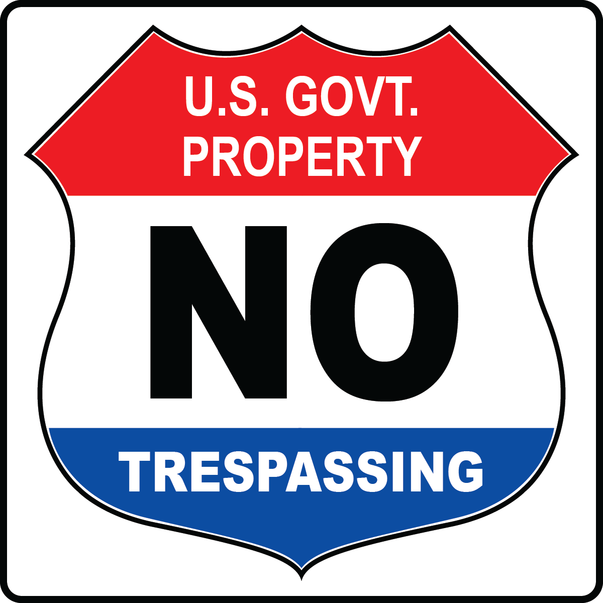 US government property no trespassing safety sign