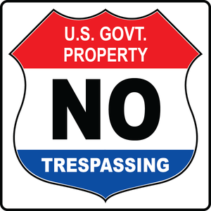 US government property no trespassing safety sign