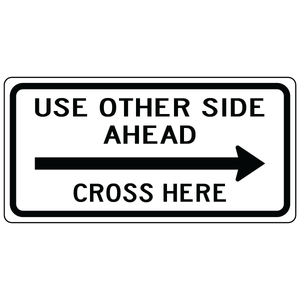 Use other side ahead cross here right sign guiding pedestrians safely across road